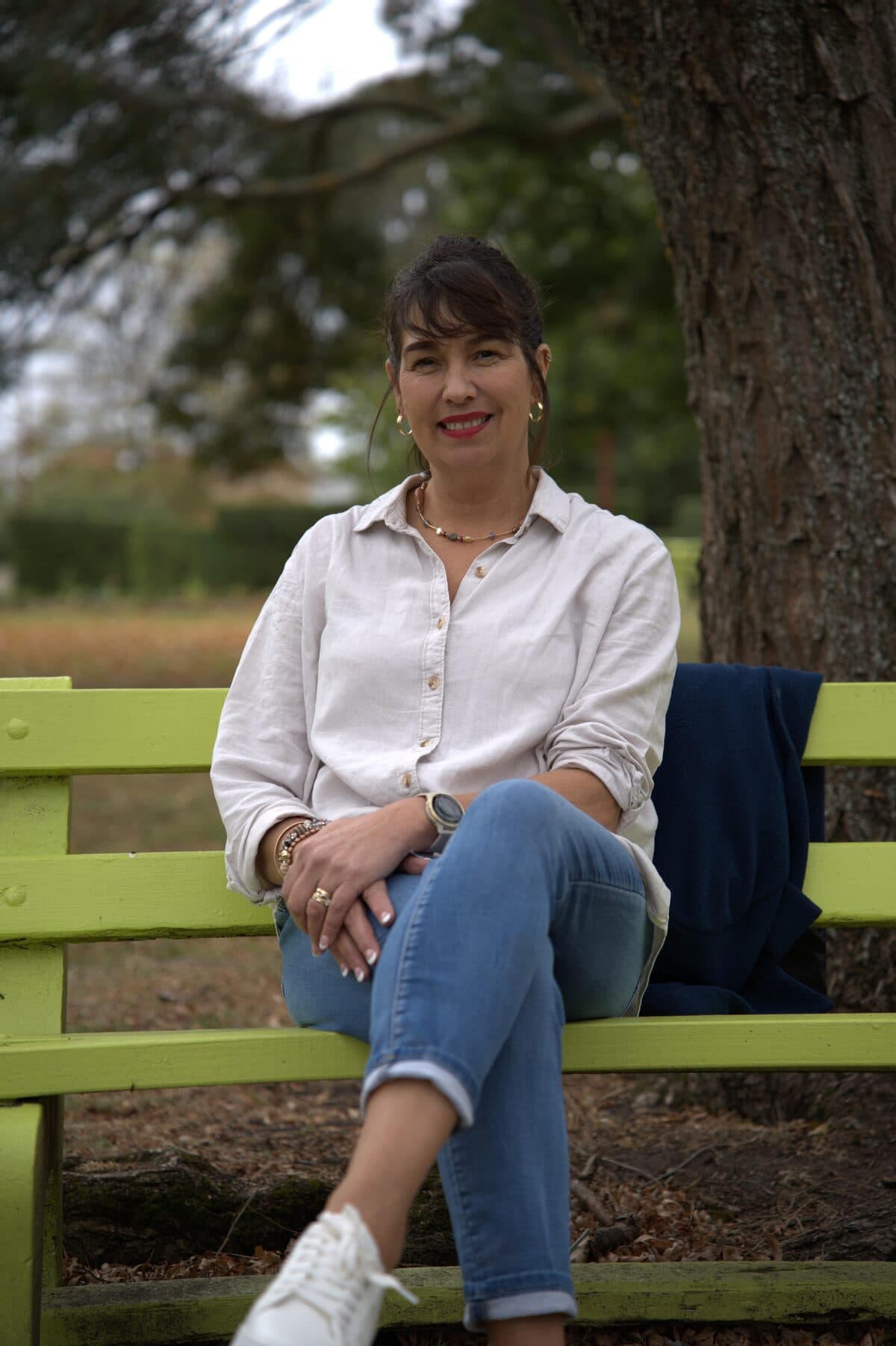 Sarah Davidson sitting on a bench outdoors